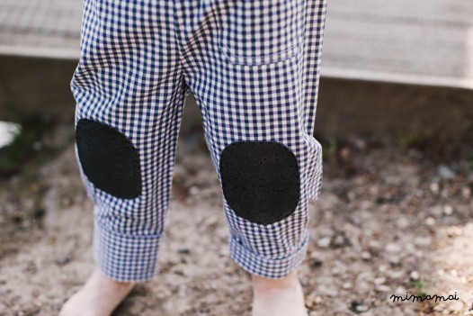 Baby trousers with green cork patches