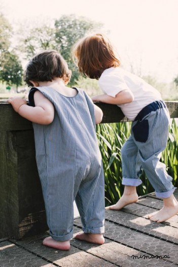 Baby dungarees with purple pocket