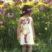 A- Sleeveless Dress Flowers in her hair