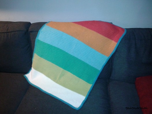 crochet baby blanket in colorful stripes