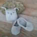 Baby shoes and knitted rabbit, handmade knitwear of organic cotton, grey