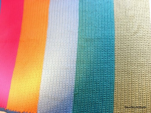 crochet baby blanket in colorful stripes