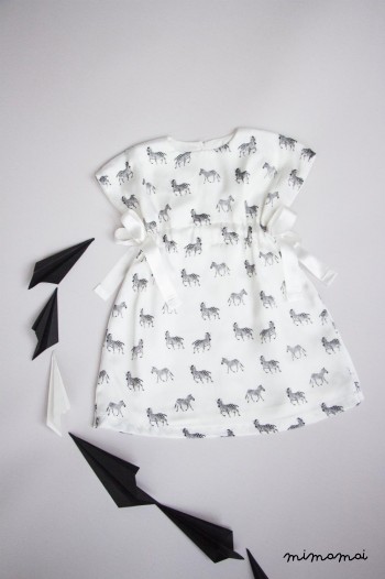 Vanilla baby dress with zebra print