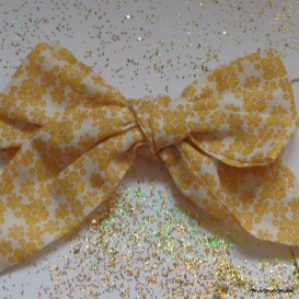 Barrette gros noeud petites fleurs moutarde