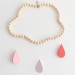 Nuage en perles de bois Framboise