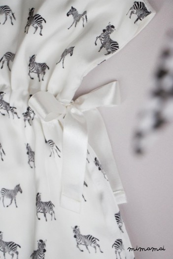 Vanilla baby dress with zebra print