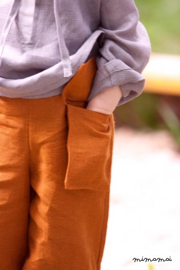 Linen terracotta trousers with a hanging pocket