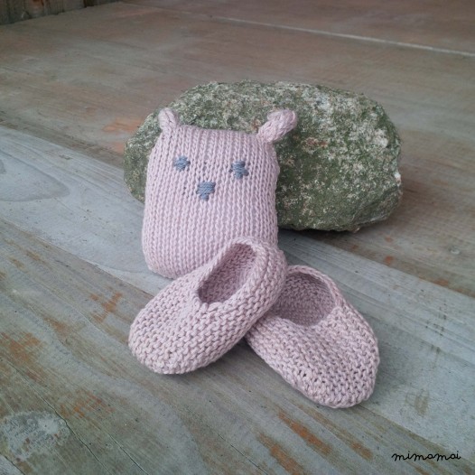 Baby shoes and knitted rabbit, handmade knitwear of organic cotton, pale rose