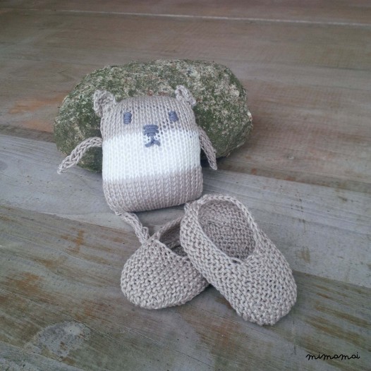 Baby shoes and knitted bear, handmade knitwear of organic cotton, beige and off white