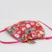 Mochila infantil muñecas