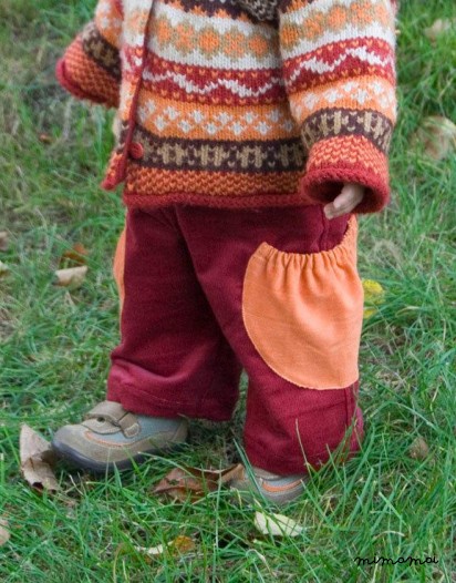 Cherry corduroy pants with big semicircle pockets