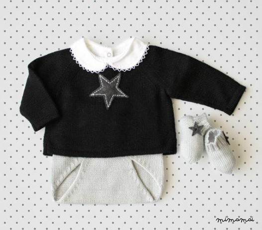 Maglia bambino insieme. Maglione, copertura del pannolino, calze. Nero e grigio.