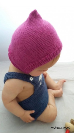 Baby pixie cap, knitted baby hat in fuscia pink wool with button closure